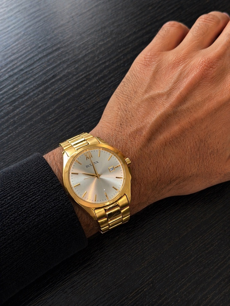 Bulova Gold Dress Watch With Champagne Dial